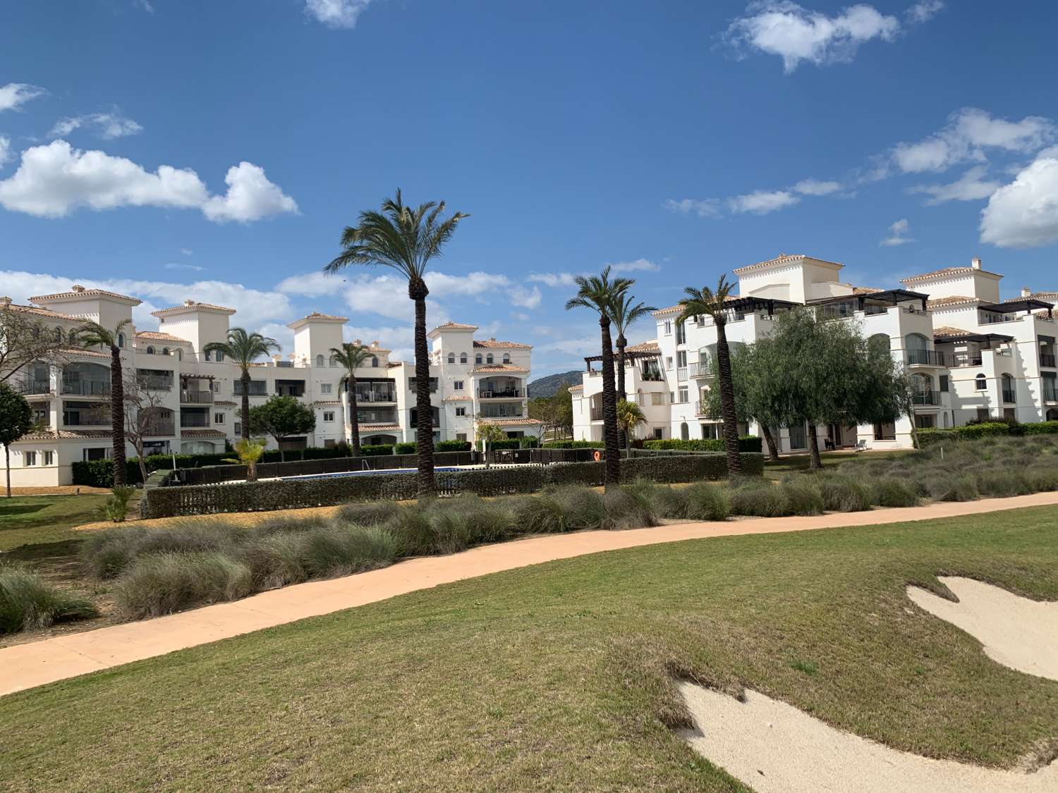 LARGE GROUND FLOOR APARTMENT IN FRONT OF THE POOL AND THE GOLF COURSE